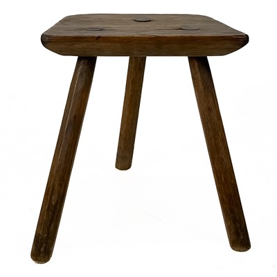 Lot 28 - An ash three legged stool