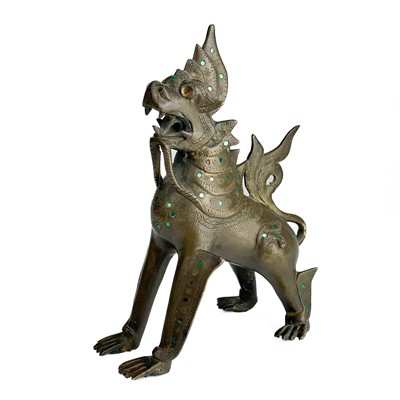 Lot 1291 - A Burmese bronze lion dog, late 19th century.