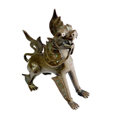Lot 1291 - A Burmese bronze lion dog, late 19th century.
