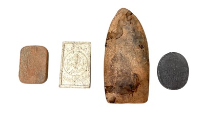 Lot 498 - A Thai Pong Roop Muean pottery amulet.