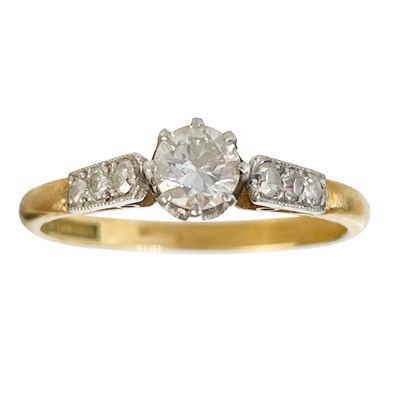 Lot 102 - An 18ct and platinum 0.30ct (approximately) diamond solitaire ring.
