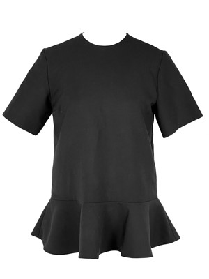 Lot 548 - A Victoria Beckham 'Peplum Top', UK size 8.