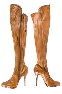 Lot 68 - A pair of Tom Ford for Gucci tan leather knee-high stiletto heel boots.