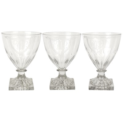 Lot 25 - A set of three Regency glass rummers.