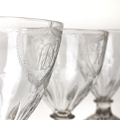 Lot 25 - A set of three Regency glass rummers.