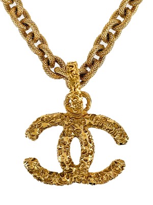 Lot 42 - A Chanel 24ct gold-plated lava collection large CC pendant necklace, circa 1993.