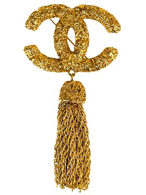 Lot 33 - A Chanel 24ct gold-plated CC lava collection tassel brooch, circa 1993.