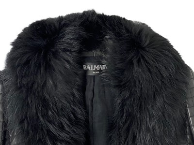 Lot 73 - A Balmain Paris black quilted lambskin and racoon fur collar biker jacket, size 38.