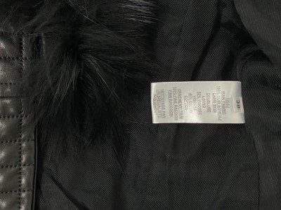 Lot 73 - A Balmain Paris black quilted lambskin and racoon fur collar biker jacket, size 38.