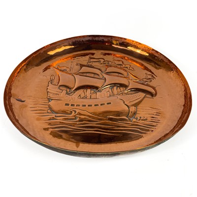 Lot 213 - A Newlyn copper circular shallow dish.