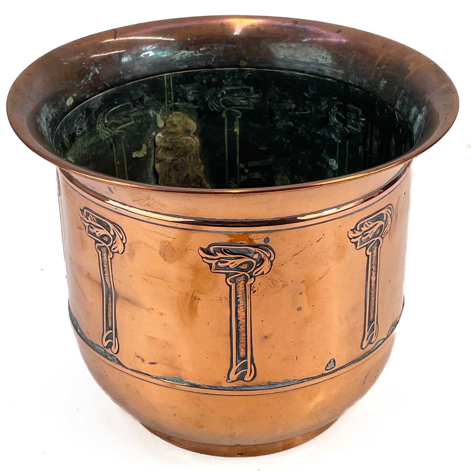 Lot 56 - An Art Nouveau copper jardiniere by Beldray.