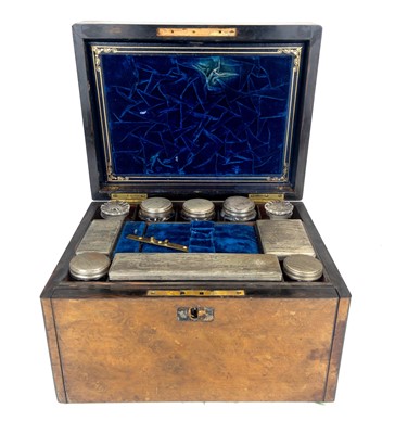 Lot 50 - A Victorian burr walnut fitted dressing case.