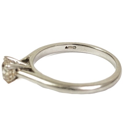 Lot 16 - A platinum 0.75ct (estimated) champagne diamond solitaire ring.