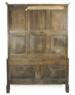 Lot 18 - A George III oak press cupboard.