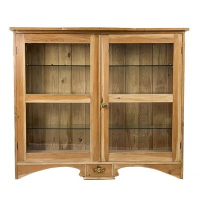 Lot 333 - A glazed pine display cabinet.