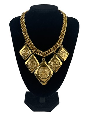 Lot 22 - A Chanel 24ct gold-plated five CC medallion choker necklace, circa 1990/91.