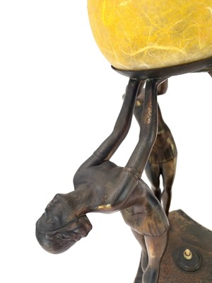 Lot 279 - An Art Deco gilt spelter figural table lamp.