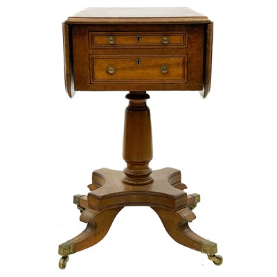 Lot 670 - A Regency mahogany drop leaf work table.