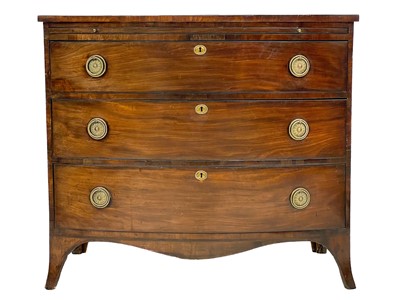 Lot 718 - A late George III mahogany bow front chest.