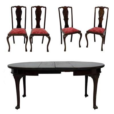 Lot 664 - An Edwardian mahogany extending dining table stamped Maple & Co, and four chairs.