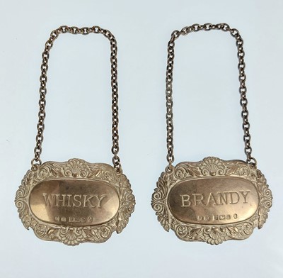 Lot 89 - A pair of modern silver spirit labels by John Round & Son Ltd.