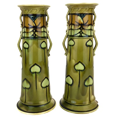 Lot 606 - A pair of Minton Secessionist vases.