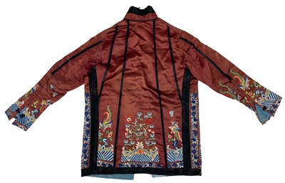 Lot 1023 - A Chinese silk embroidered jacket, early 20th century.