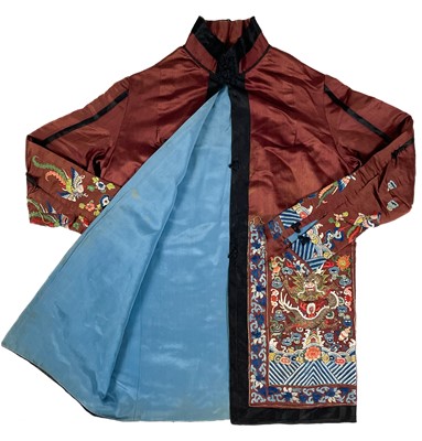 Lot 1023 - A Chinese silk embroidered jacket, early 20th century.