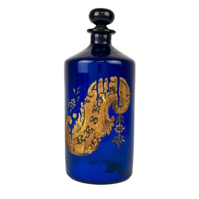 Lot 304 - A Victorian blue glass apothecary bottle and stopper.