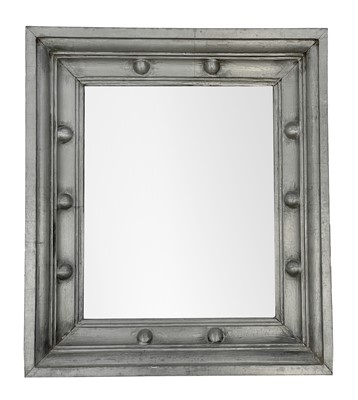 Lot 638 - An Art Deco style pewter clad wall mirror.