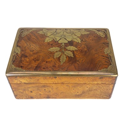 Lot 85 - A Continental elm and brass inlaid trinket box.