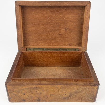 Lot 85 - A Continental elm and brass inlaid trinket box.