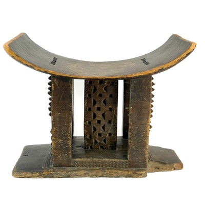 Lot 264 - A carved hardwood Ashanti stool.