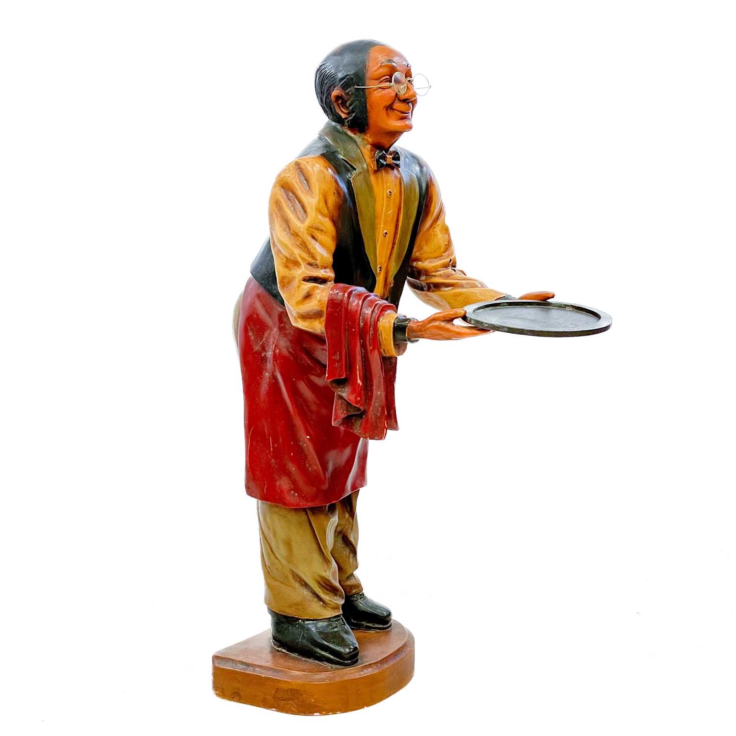 Lot 89 - A fibreglass figural dumbwaiter.