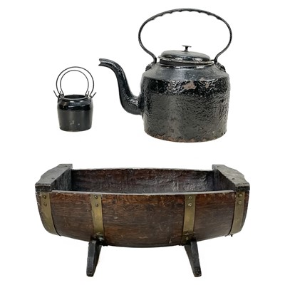 Lot 181 - An oak half barrel planter.