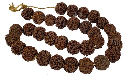 Lot 72 - An Indian thirty-two rudraksha bead necklace.