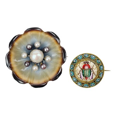 Lot 30 - A Victorian micromosaic beetle decorated brooch and a carved banded agate and pearl flower brooch.