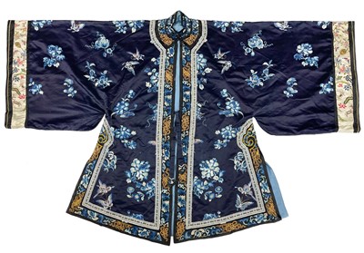 Lot 1051 - A Chinese silk embroidered robe, 19th century.