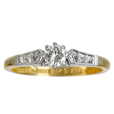 Lot 297 - An 18ct and platinum 0.15ct diamond solitaire ring.