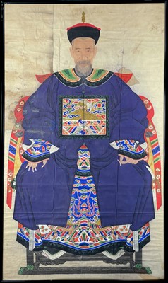 Lot 1054 - A large pair of Chinese ancestor portrait paintings, 19th century.