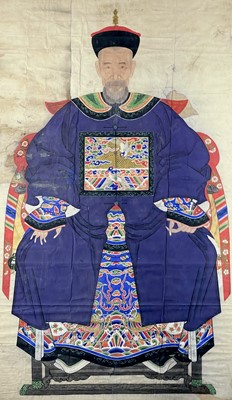 Lot 1054 - A large pair of Chinese ancestor portrait paintings, 19th century.