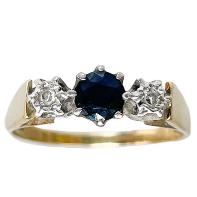 Lot 172 - A modern 9ct hallmarked gold diamond and sapphire three stone ring.