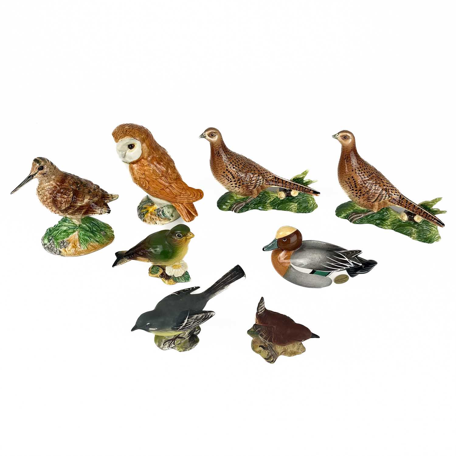 Lot 450 - A collection of Beswick pottery birds.