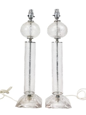 Lot 585 - A pair of mid 20th century French glass table lamps.