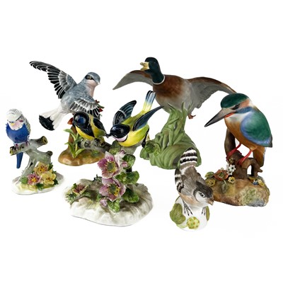 Lot 457 - A collection of six hand painted ceramic birds.