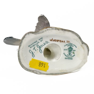 Lot 457 - A collection of six hand painted ceramic birds.