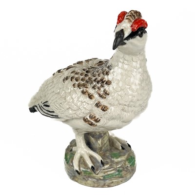 Lot 512 - A collection of hand painted ceramic birds.