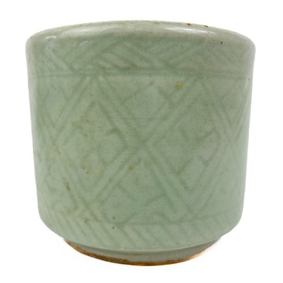 Lot 1155 - A Chinese celadon porcelain brush pot, 19th century.