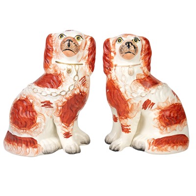 Lot 53 - A pair of Staffordshire pottery spaniels.
