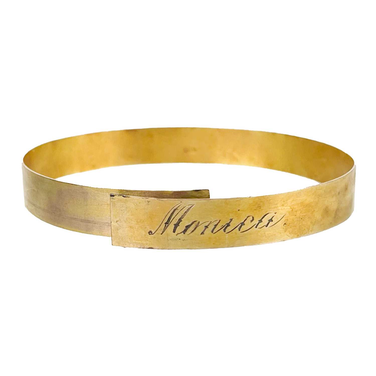 Lot 315 - A 9ct gold bangle.